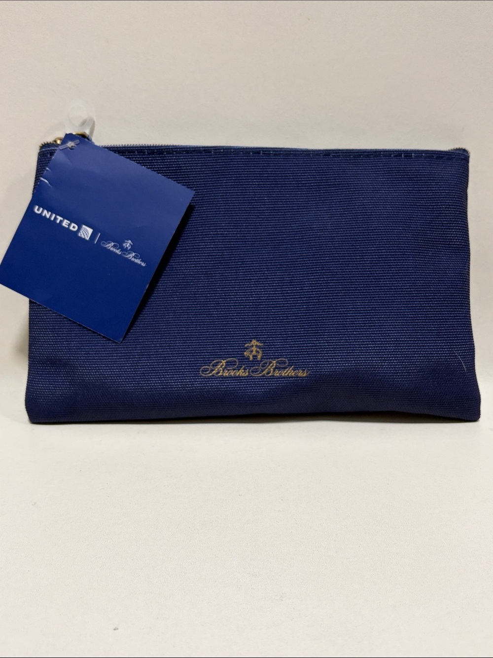 Brooks Brothers travel bag filled with travel products